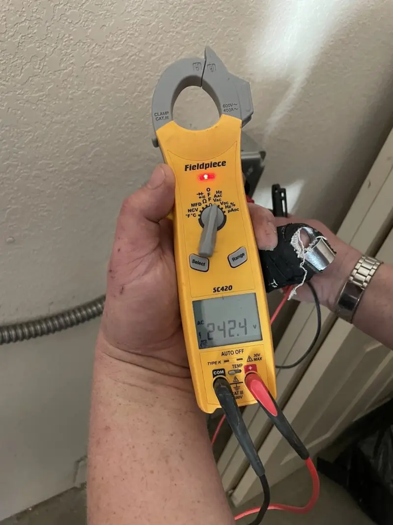 Voltage testing with clamp meter during Aluminum Wiring Replacement in Covington